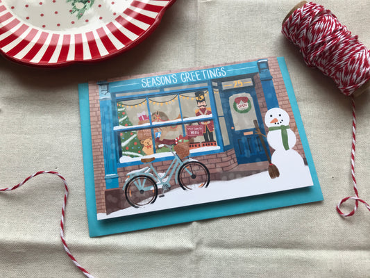 Seasons Greetings Illustrated Toy Shop Christmas Card